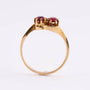 14 carat gold ring with two garnets