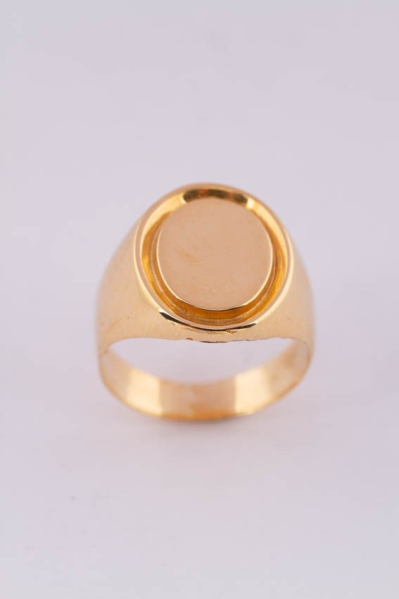 18 carat gold plate/pinky ring.