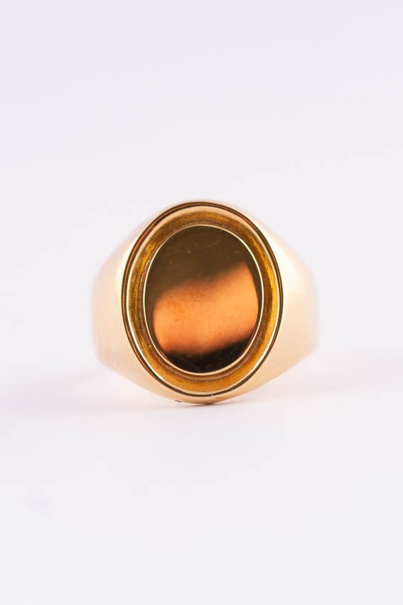 18 carat gold plate/pinky ring.