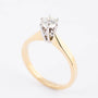 White/yellow gold solitaire ring with a brilliant (0.5 ct.)
