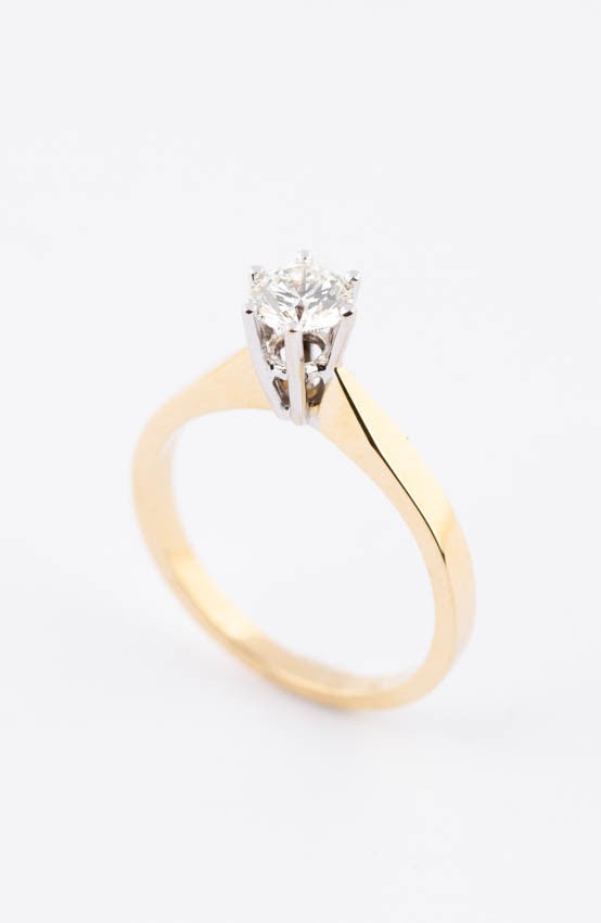 Wit/geel gouden solitair ring met een briljant (0.5 ct.)
