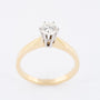 White/yellow gold solitaire ring with a brilliant (0.5 ct.)