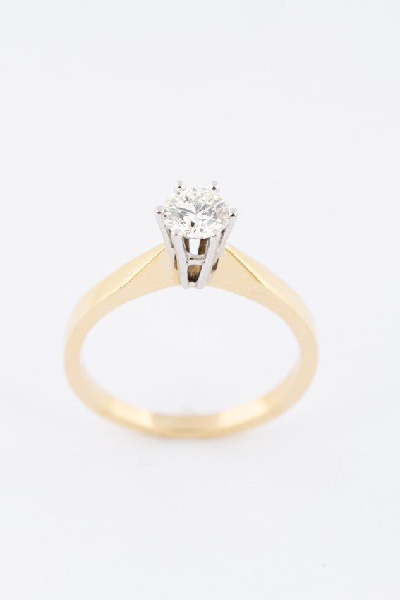 Wit/geel gouden solitair ring met een briljant (0.5 ct.)