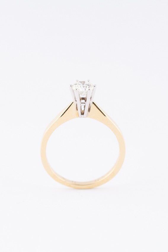 White/yellow gold solitaire ring with a brilliant (0.5 ct.)