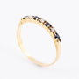 Gold row ring with diamonds and sapphires