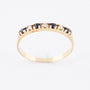 Gold row ring with diamonds and sapphires