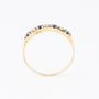 Gold row ring with diamonds and sapphires