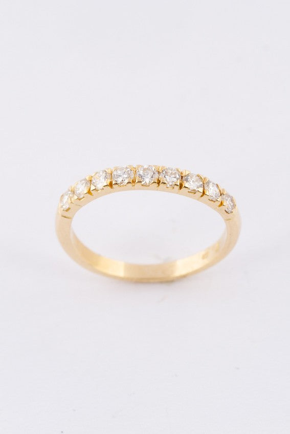 Gouden rij ring met 9 briljanten. 0.45 ct.