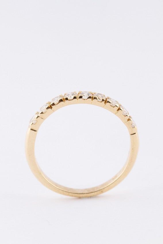 Gouden rij ring met 9 briljanten. 0.45 ct.