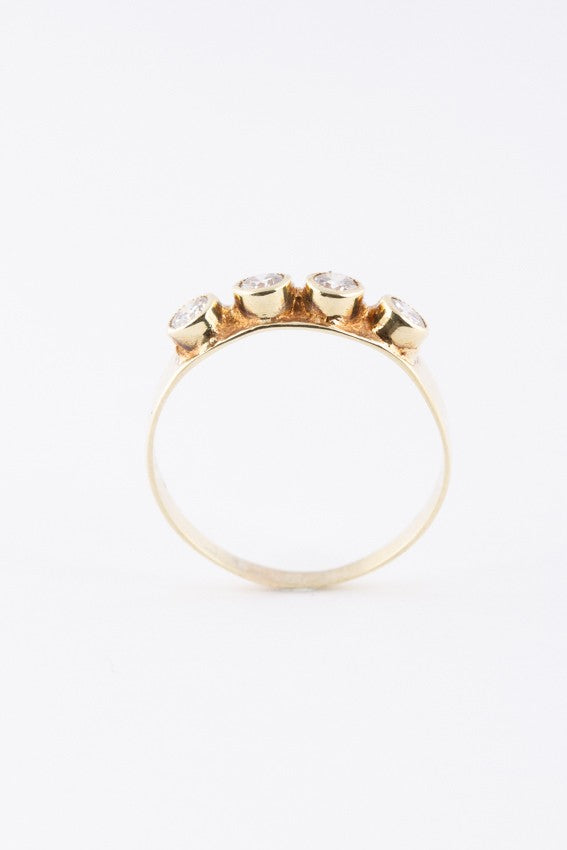 Yellow gold ring with 4 brilliant-cut diamonds