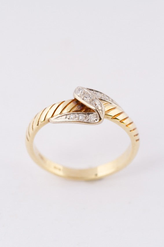 Wit/geel gouden slag ring met 9 diamanten