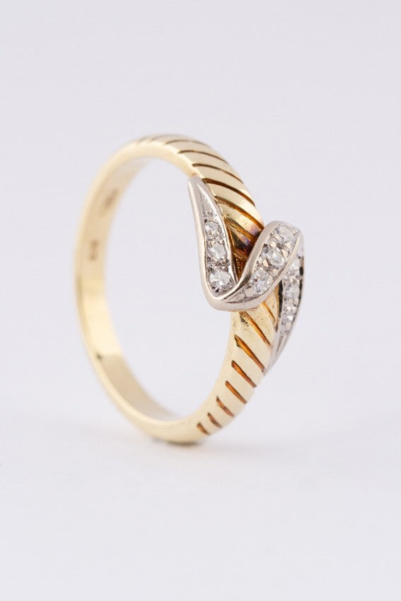 Wit/geel gouden slag ring met 9 diamanten
