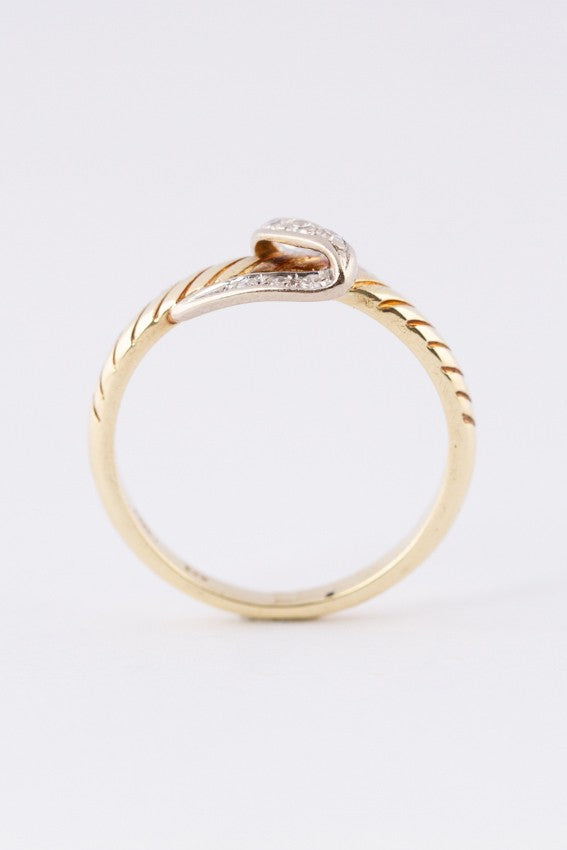 Wit/geel gouden slag ring met 9 diamanten