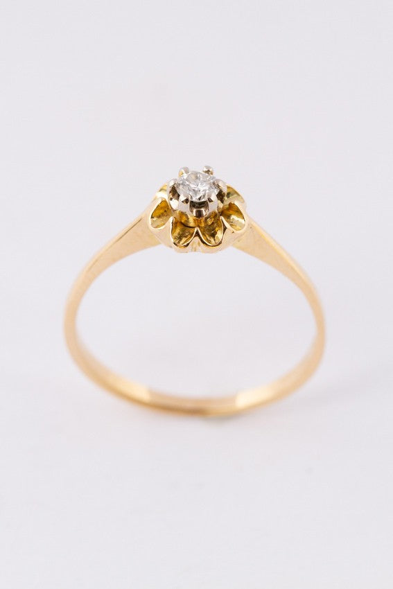 Gouden solitair ring met een briljant van ca. 0.13 ct.