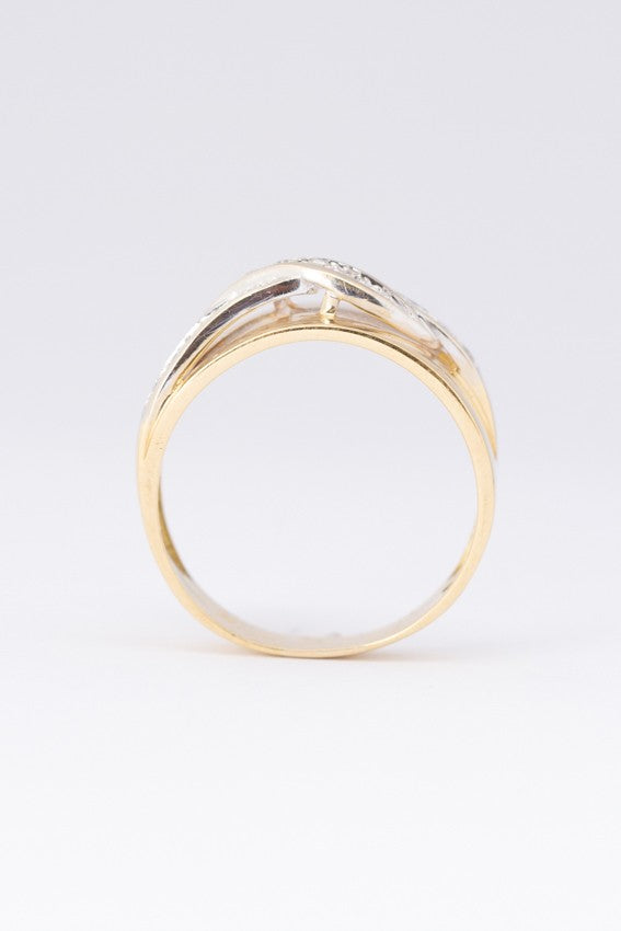 Gouden ring met een wit gouden applique