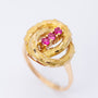 Gouden ring met robijnen