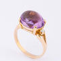 Gold ring with an amethyst and diamonds