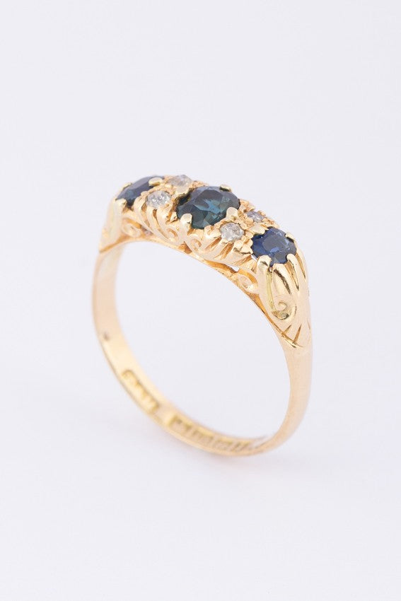 English gold ring with sapphire and diamonds
