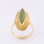 Gold ring with jade