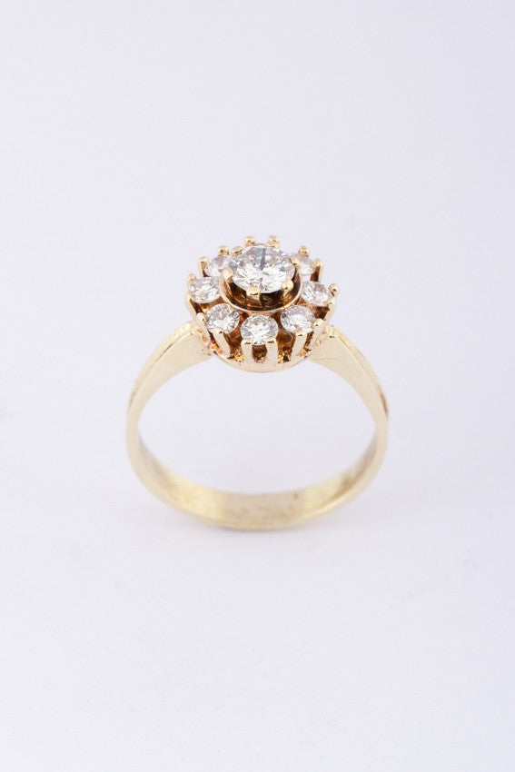 Gold entourage ring with diamonds
