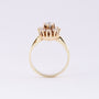 Gold entourage ring with diamonds