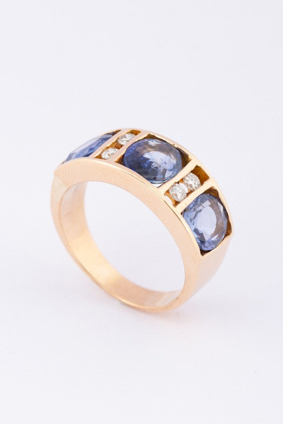 Gold row ring with sapphires and diamonds