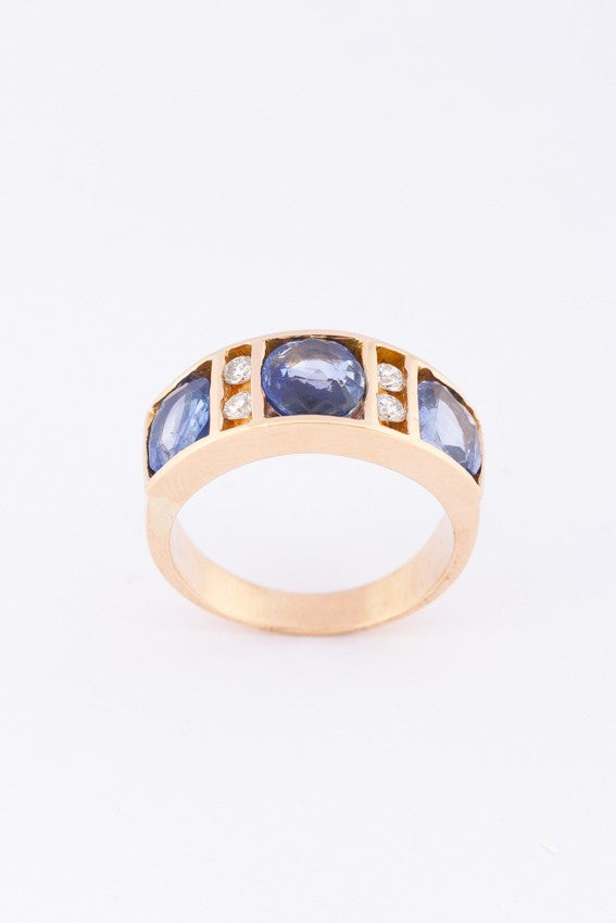Gold row ring with sapphires and diamonds
