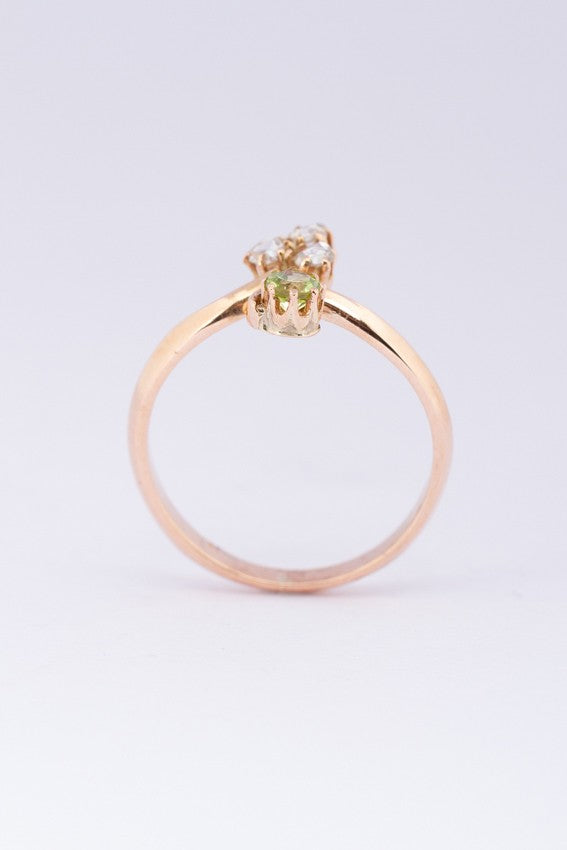 Gouden slagring met diamanten en peridoot