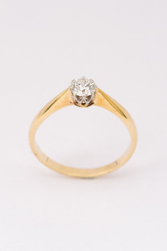 Gouden solitair ring met een briljant