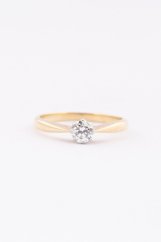 Gouden solitair ring met een briljant