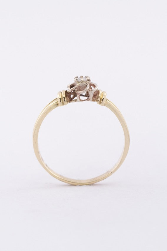 Gouden solitair ring met een briljant