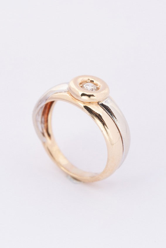 White/yellow gold ring with a brilliant