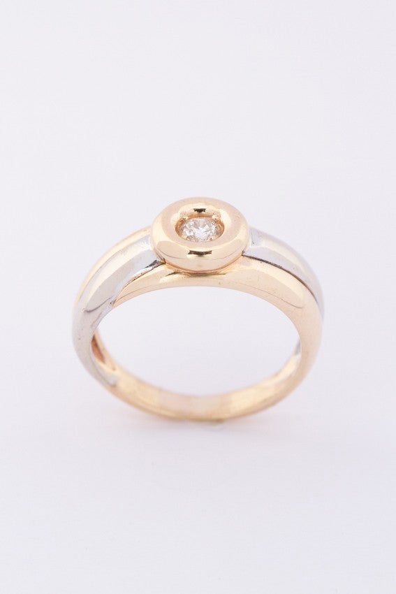 White/yellow gold ring with a brilliant