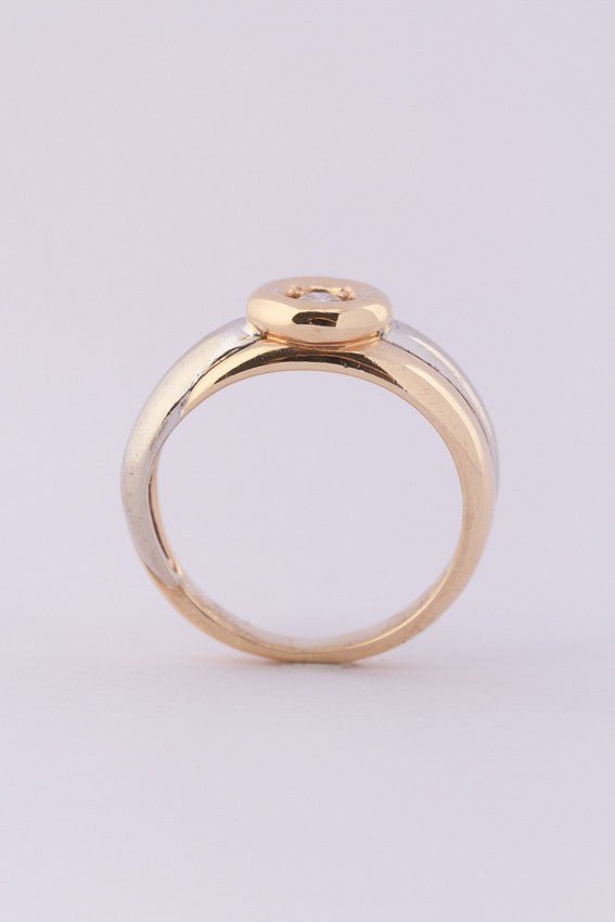 Wit/geel gouden ring met een briljant