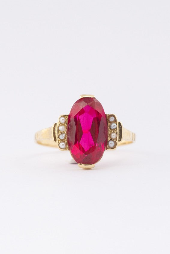 Gouden ring met robijn en zaadparels