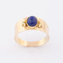 Gold ring with lapis lazuli.