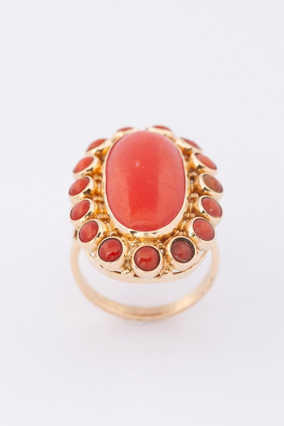 Gold entourage ring with blood corals