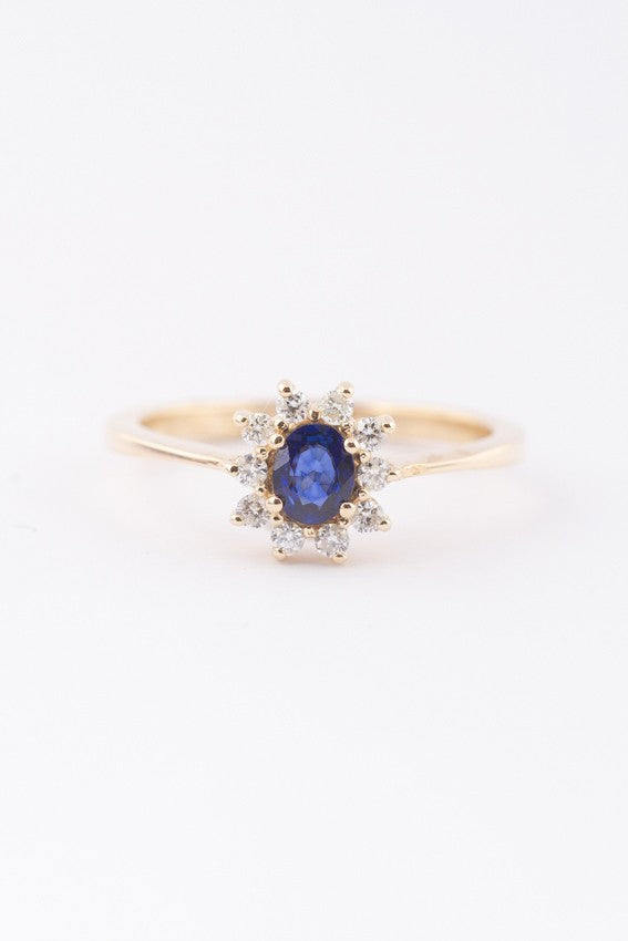 Gouden entourage ring met saffier en briljanten