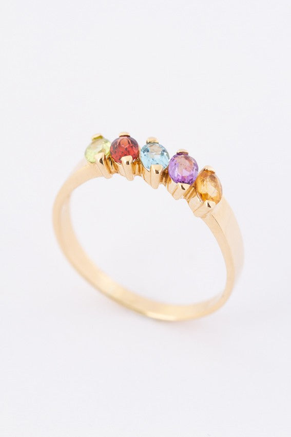 Gouden rij ring met diverse edelstenen