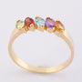 Gouden rij ring met diverse edelstenen