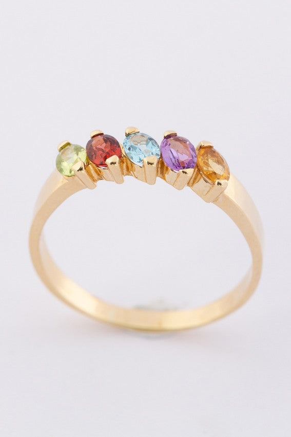 Gouden rij ring met diverse edelstenen
