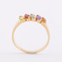 Gouden rij ring met diverse edelstenen
