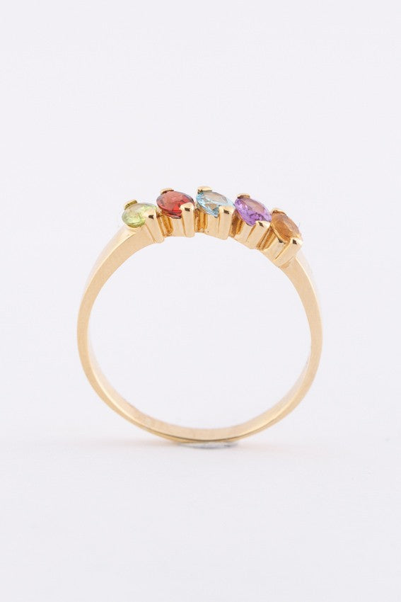 Gouden rij ring met diverse edelstenen