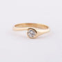 Geel gouden slag ring met een briljant