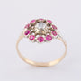 Antieke entourage ring met diamant en robijnen