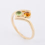 Gouden slag ring met peridoot en citrien