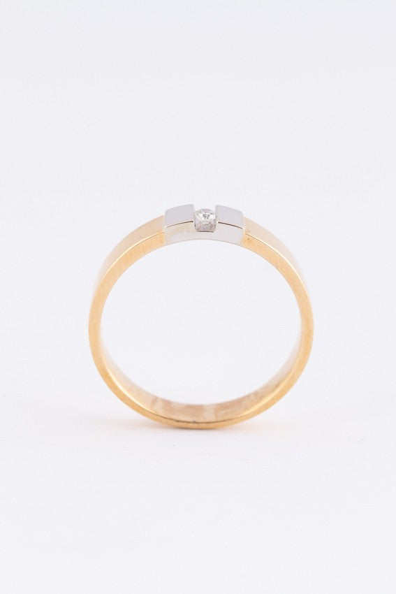 Wit/rosé gouden ring met een briljant van 0.04 ct.