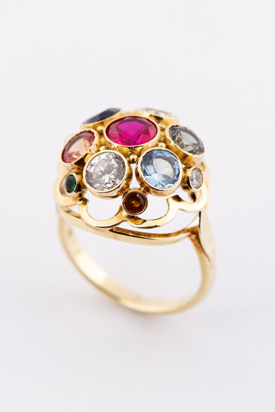 Gouden cocktail ring met diverse synthetische edelstenen