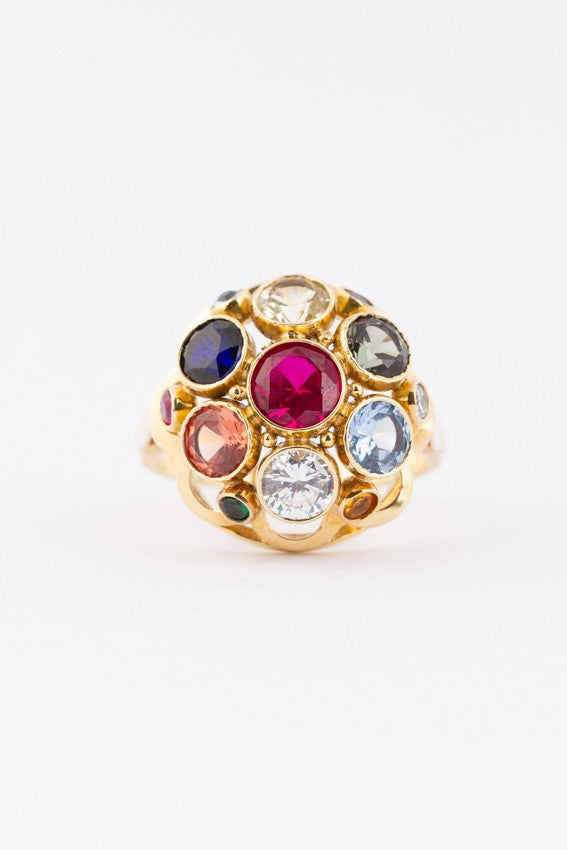 Gouden cocktail ring met diverse synthetische edelstenen