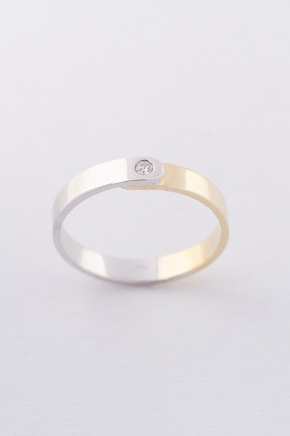 Wit/geel gouden ring met een briljant